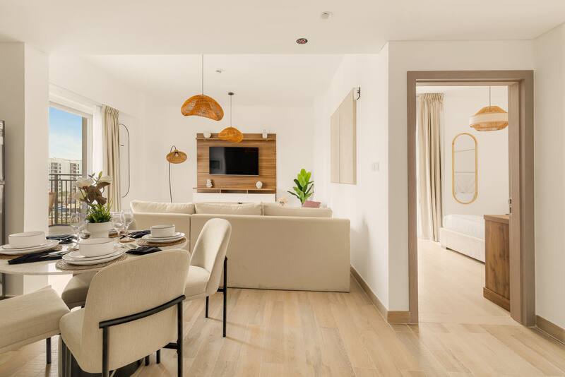 Dining table for four beside the living room
